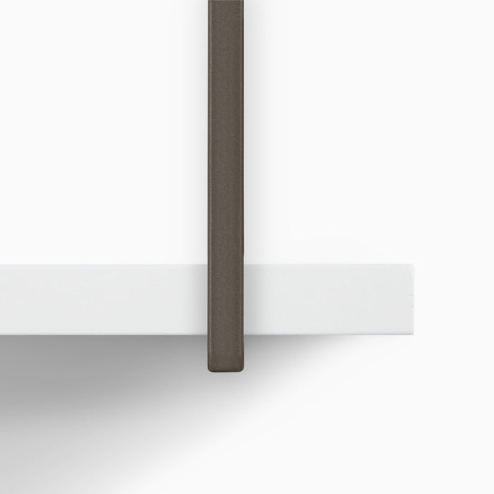Verne White 2 Tiered Shelf close-up showing rust-resistant stainless steel bracket with minimalist white floating shelf design