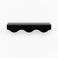 Wave Cabinet Pull in matte black with smooth flowing curves for durable, minimalist floating shelf hardware design