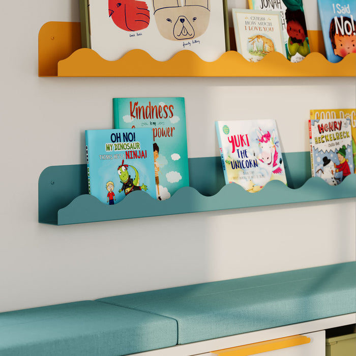 Wave Picture Ledge in muted teal steel with wave-patterned edge for functional wall display and floating shelf organization