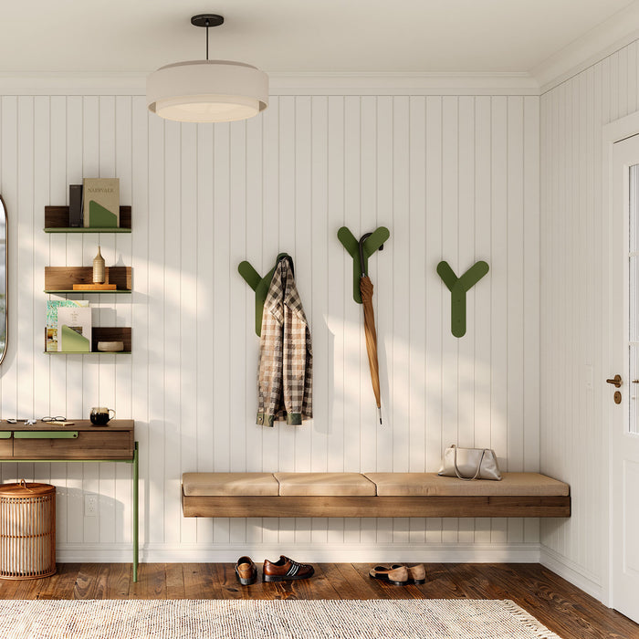 Why Not More Huge Wall Hook in olive green steel holding coat and umbrella in minimalist entryway with floating bench and shelves