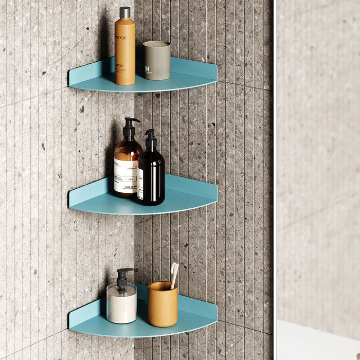 Wink Round Corner Shelf in matte steely blue steel with slim ledge and compact design for efficient bathroom corner organization