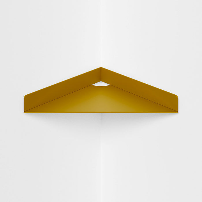 Wink Triangle Corner Shelf in matte gold steel with clean geometric design for functional corner wall display and organization