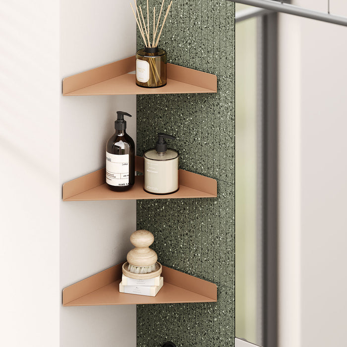 Wink Triangle Corner Shelf in muted clay steel with minimalist design for sleek wall display and space-saving organization