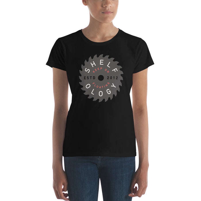 Women's Rough Sawn T-shirt in black featuring a circular saw blade graphic with Shelfology branding for casual wear