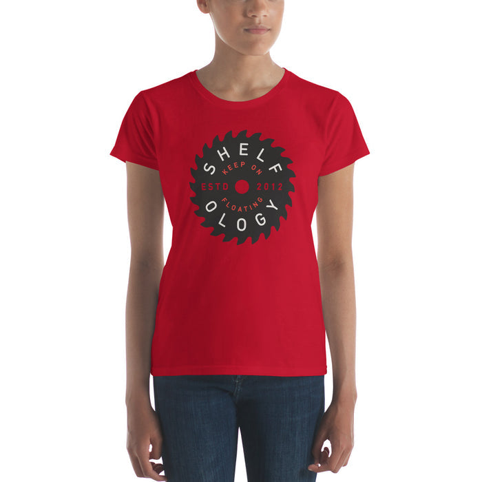 Women's Rough Sawn T-shirt in vibrant red with circular saw blade graphic and Shelfology branding for casual wear