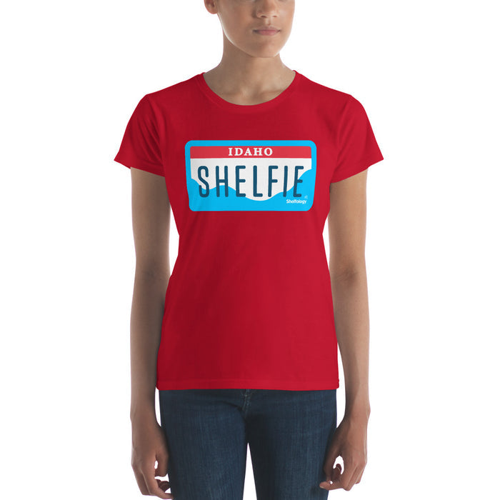 Women's Shelfie T-shirt in true red featuring a blue and white Idaho license plate graphic for casual style