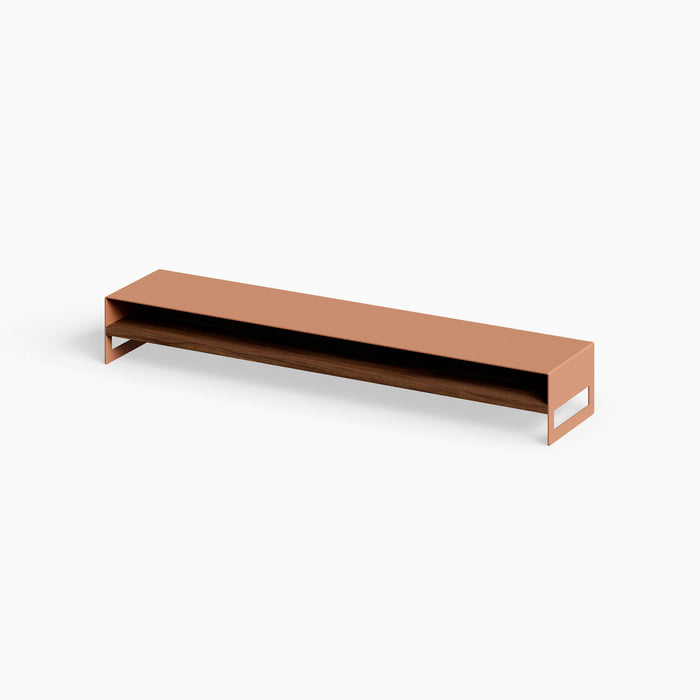Woz Monitor Stand featuring a minimalist mixed-material design with a rust-resistant steel frame and walnut wood shelf for functional workspace organization.