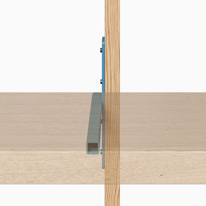 Yuri HD Floating Desk Bracket (Powder Coated) in powder blue metal supporting a slim wood floating shelf edge.